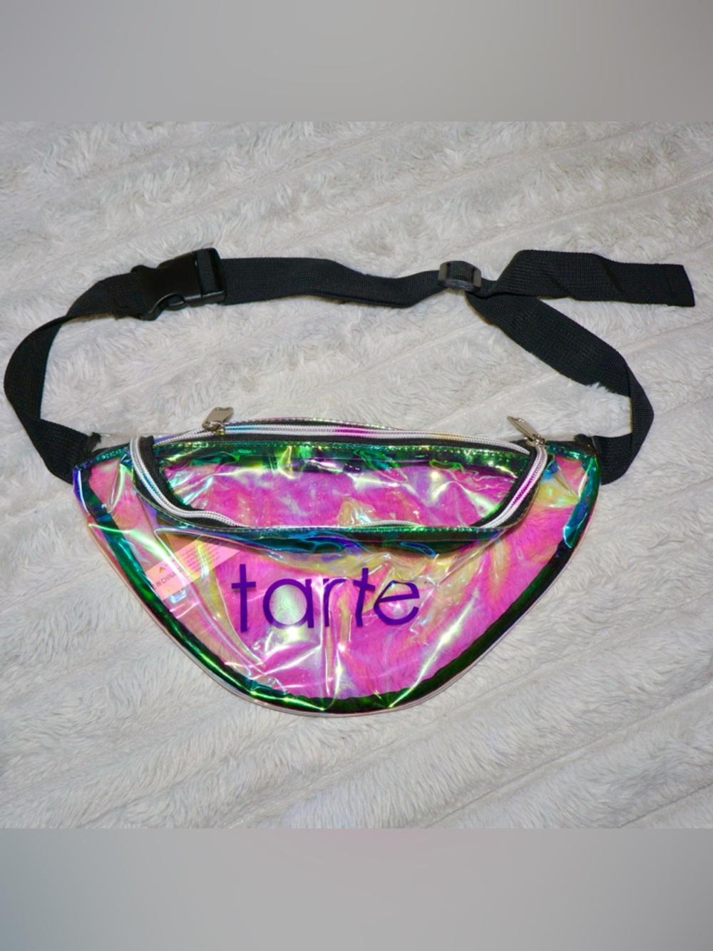 tarte Iridescent Holographic Belt Bag in Pink and Green